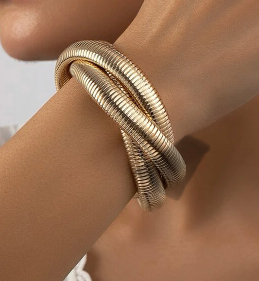 Twisted gold cuff bangle